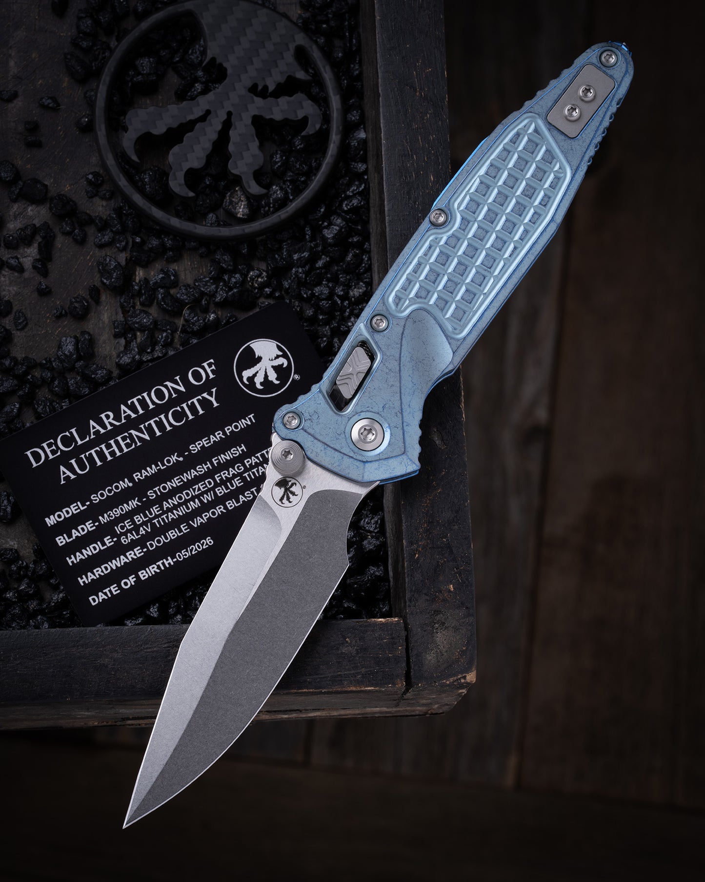 Socom® RAM-LOK® – Spear Point Marfione Select Stonewash Finish Ice Blue Anodized Frag Pattern Titanium W/ Blue Titanium Accent Double Vapor Blast Stainless (160RL-10FRSMS7)