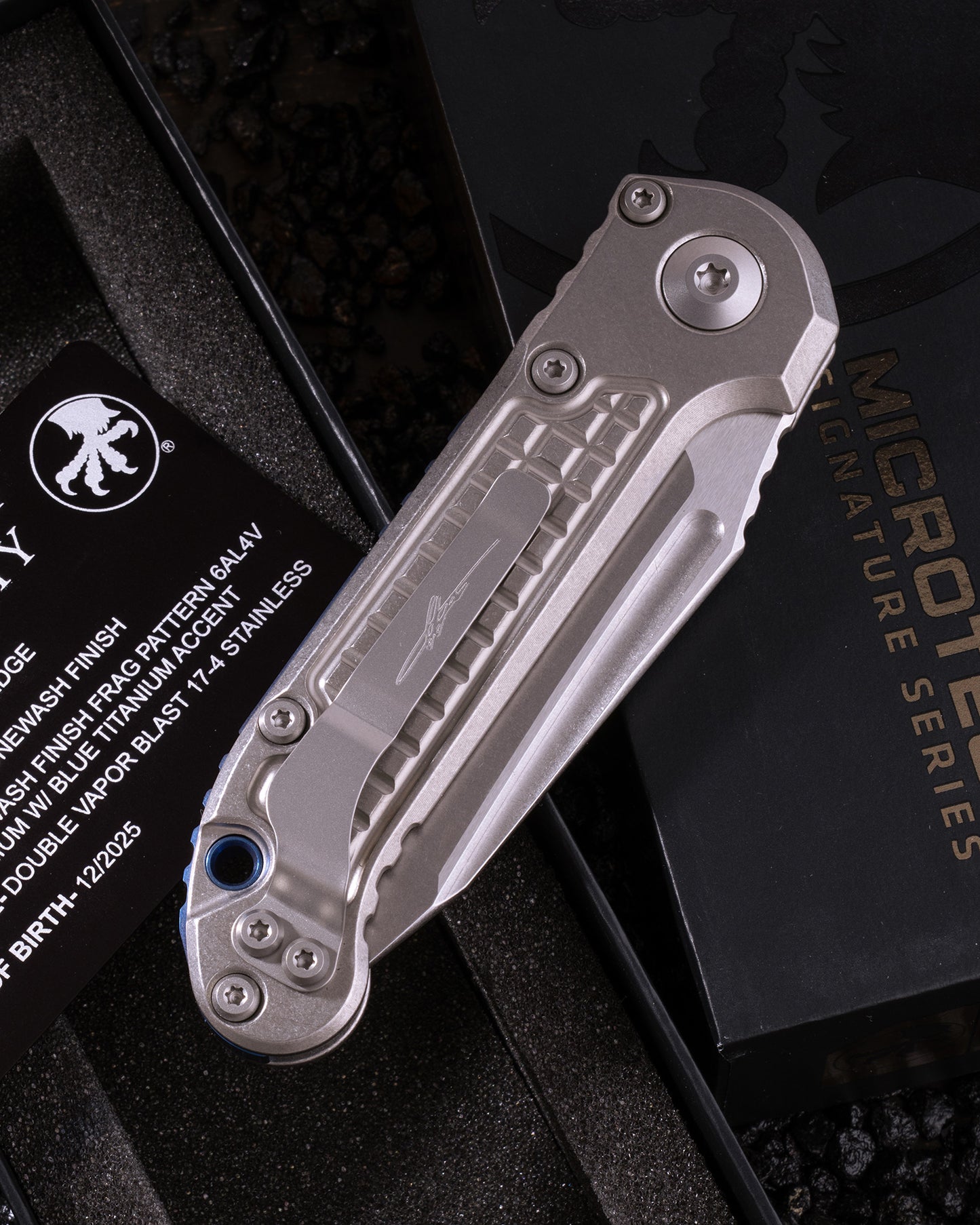 LUDT – TANTO EDGE MARFIONE SELECT STONEWASH FINISH STONEWASH FINISH FRAG PATTERN TITANIUM W/BLUE TITANIUM ACCENT DOUBLE VAPOR BLAST STAINLESS