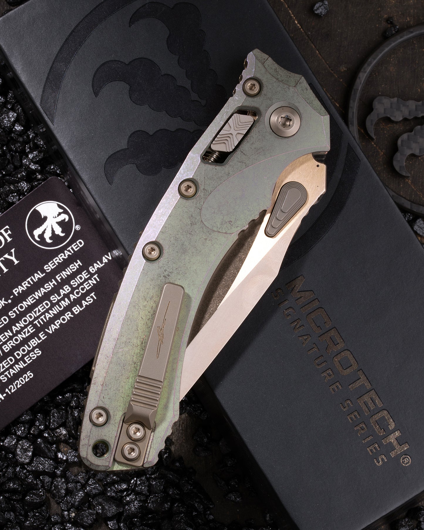 AMPHILBIAN RAM-LOK PARTIAL SERRATED MARFIONE SELECT BRONZED STONEWASH FINISH ANTIQUE GREEN ANODIZED SLAB SIDE TITANIUM W/ BRONZE TITANIUM ACCENT BRONZED DOUBLE VAPOR BLAST STAINLESS