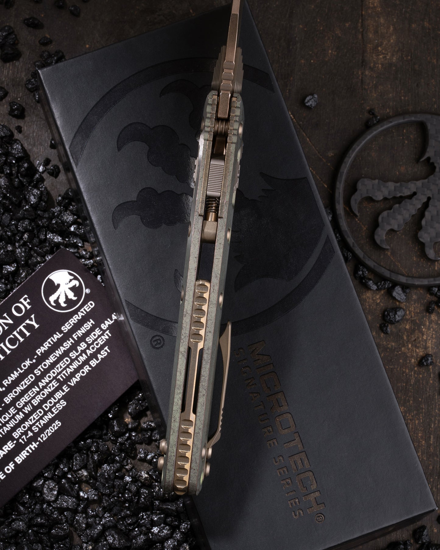 AMPHILBIAN RAM-LOK PARTIAL SERRATED MARFIONE SELECT BRONZED STONEWASH FINISH ANTIQUE GREEN ANODIZED SLAB SIDE TITANIUM W/ BRONZE TITANIUM ACCENT BRONZED DOUBLE VAPOR BLAST STAINLESS