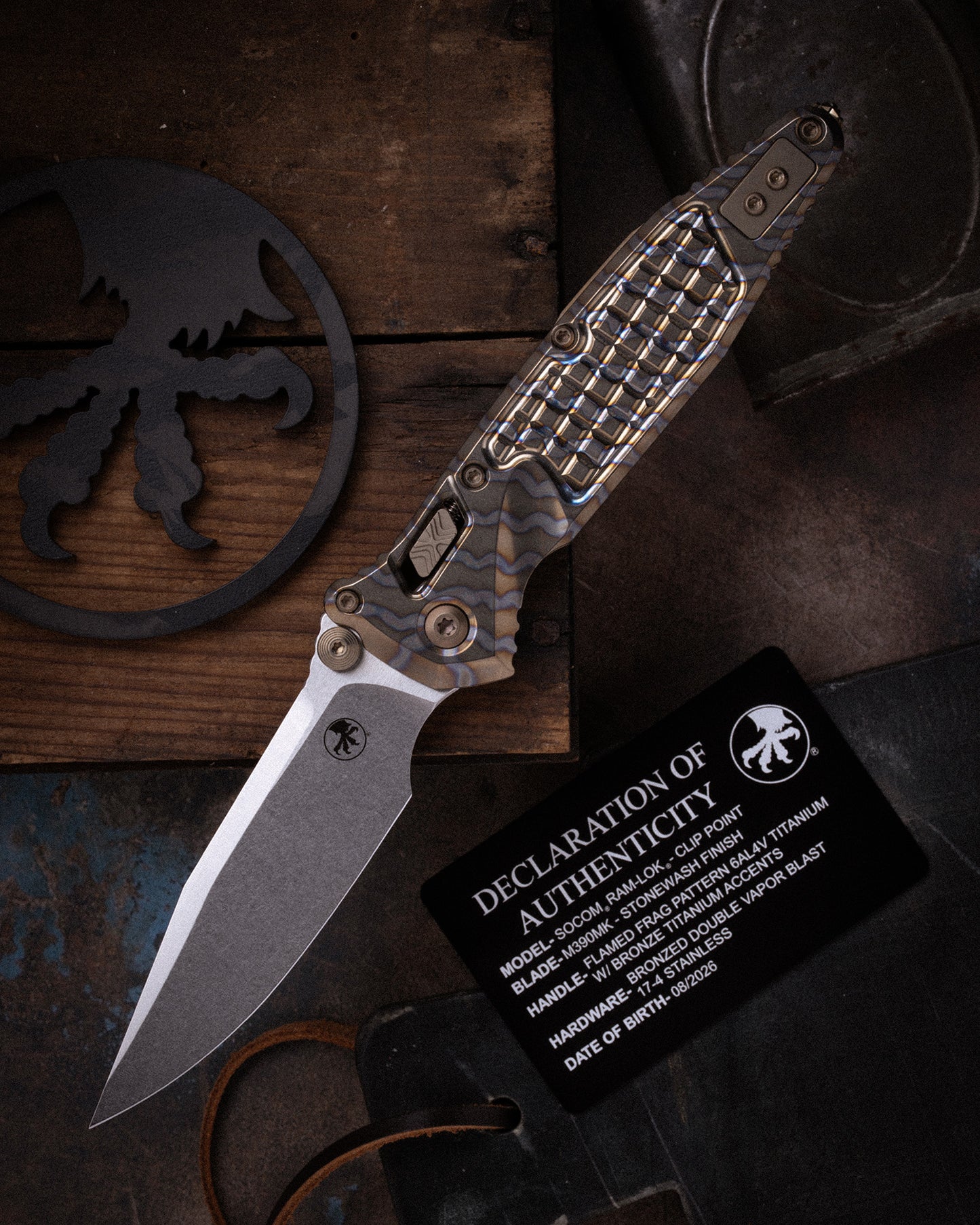 Socom® RAM-LOK® Clip Point Marfione Select Stonewash Finish Stonewash Flamed Frag Pattern Titanium W/ Bronze Titanium Accents Bronzed Double Vapor Blast Stainless (160RL-10FRMS8)