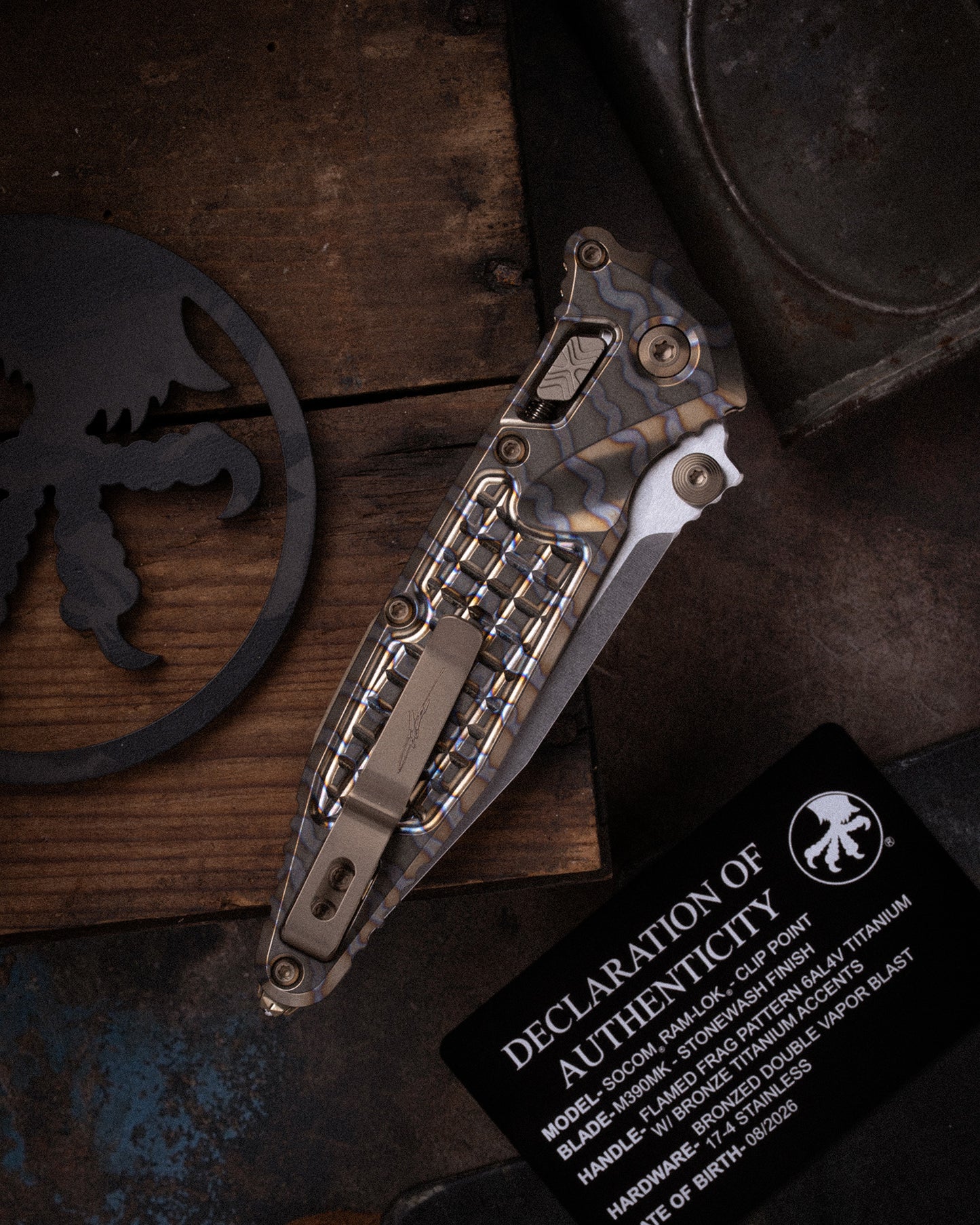 Socom® RAM-LOK® Clip Point Marfione Select Stonewash Finish Stonewash Flamed Frag Pattern Titanium W/ Bronze Titanium Accents Bronzed Double Vapor Blast Stainless (160RL-10FRMS8)