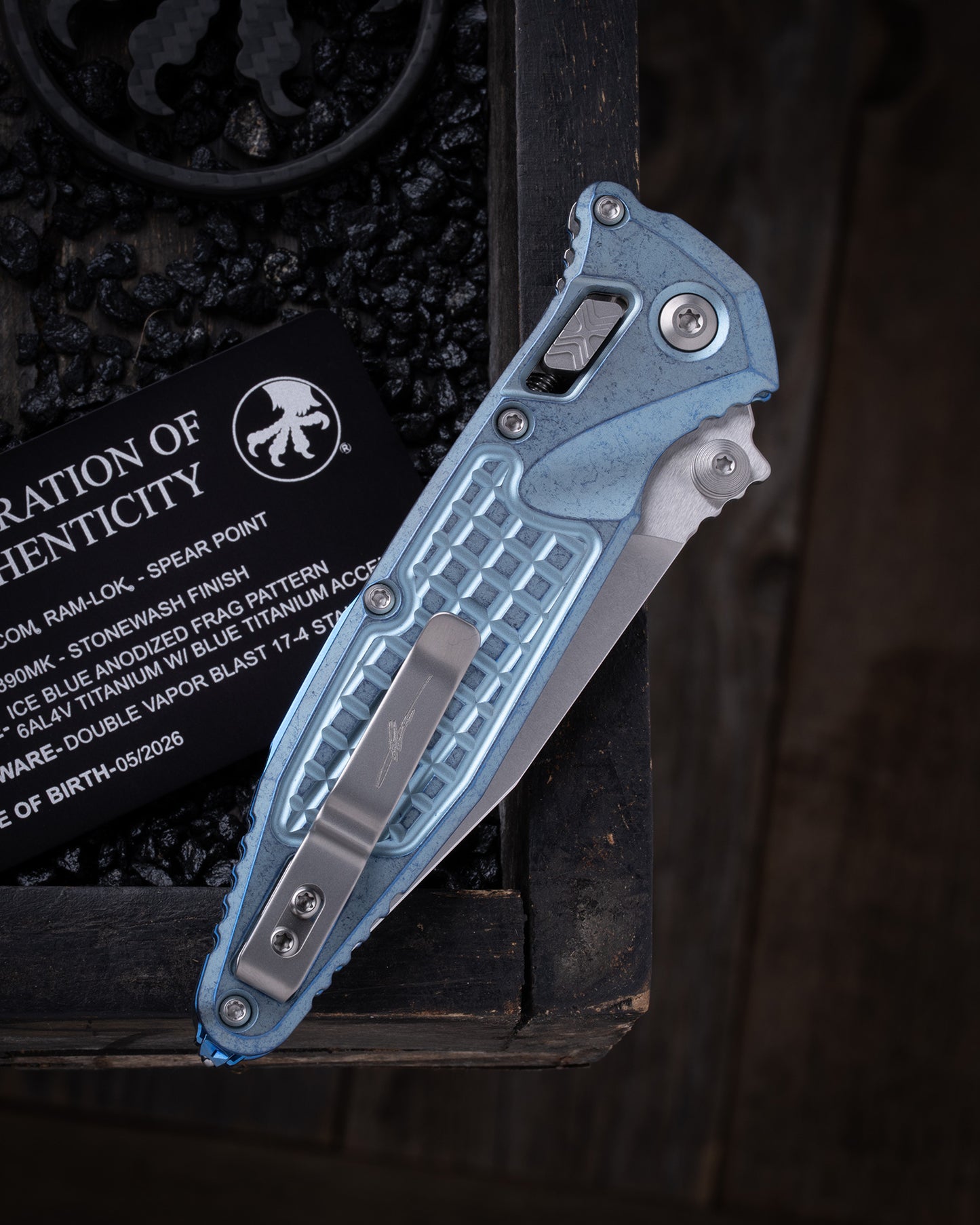 Socom® RAM-LOK® – Spear Point Marfione Select Stonewash Finish Ice Blue Anodized Frag Pattern Titanium W/ Blue Titanium Accent Double Vapor Blast Stainless (160RL-10FRSMS7)