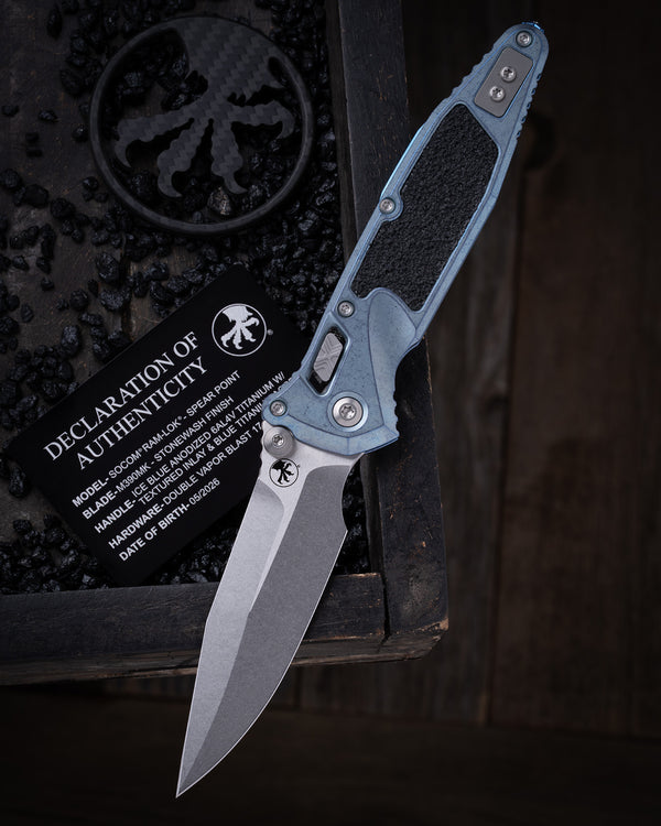 Socom® RAM-LOK® – Spear Point Marfione Select Stonewash Finish Ice Blue Anodized Frag Pattern Titanium W/ Blue Titanium Accent Double Vapor Blast Stainless (160RL-10SMS7)