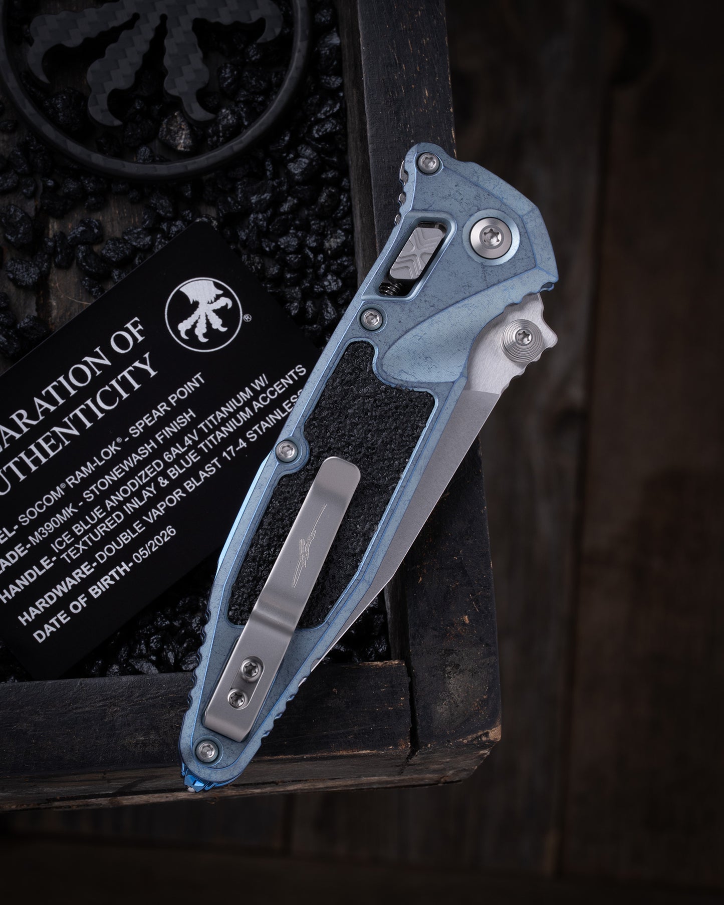 Socom® RAM-LOK® – Spear Point Marfione Select Stonewash Finish Ice Blue Anodized Frag Pattern Titanium W/ Blue Titanium Accent Double Vapor Blast Stainless (160RL-10SMS7)