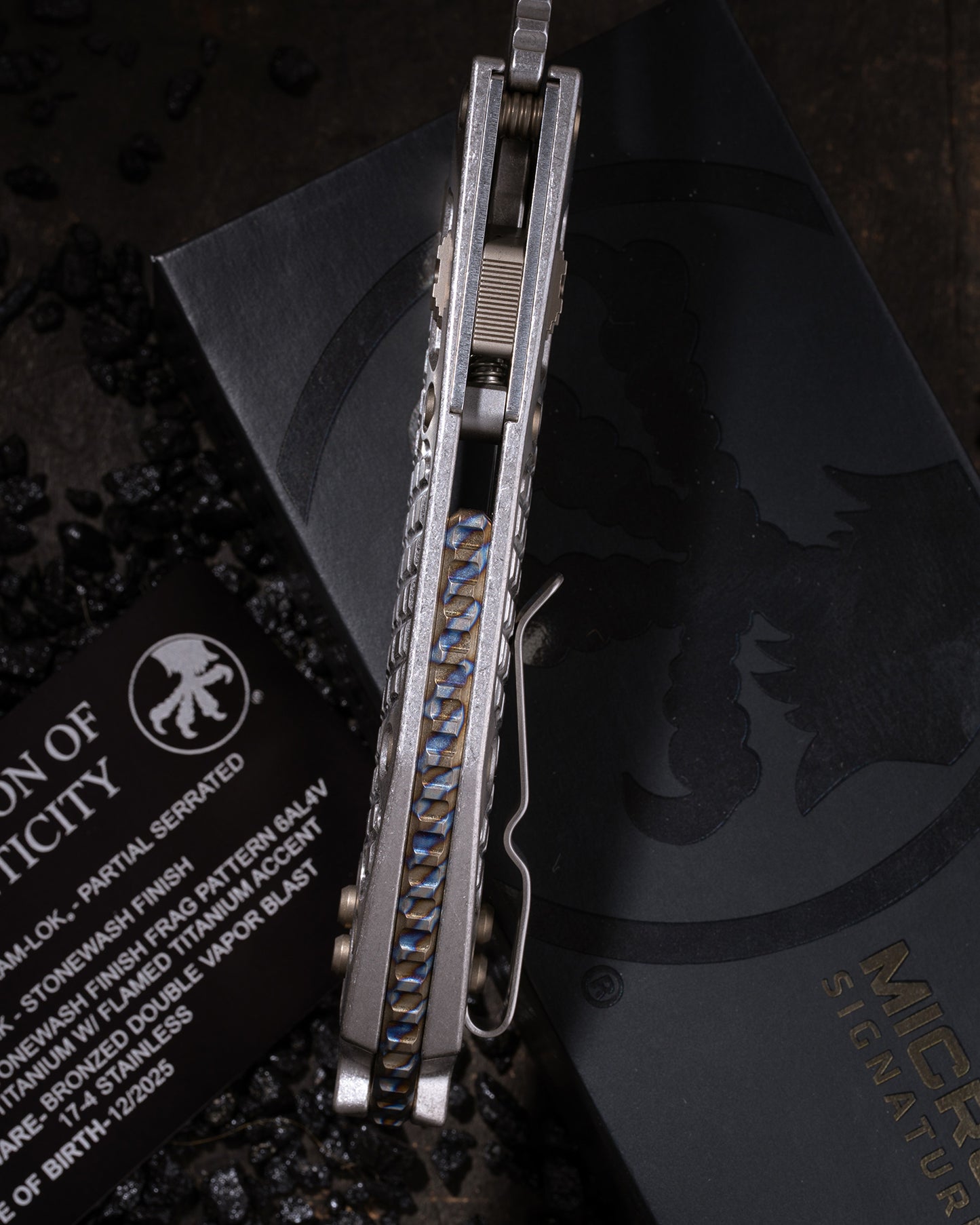 STITCH RAM-LOK PARTIAL SERRATED MARFIONE SELECT STONEWASH FINISH STONEWASH FINISH FRAG PATTERN TITANIUM W/ FLAMED TITANIUM ACCENT BRONZED DOUBLE VAPOR BLAST STIANLESS
