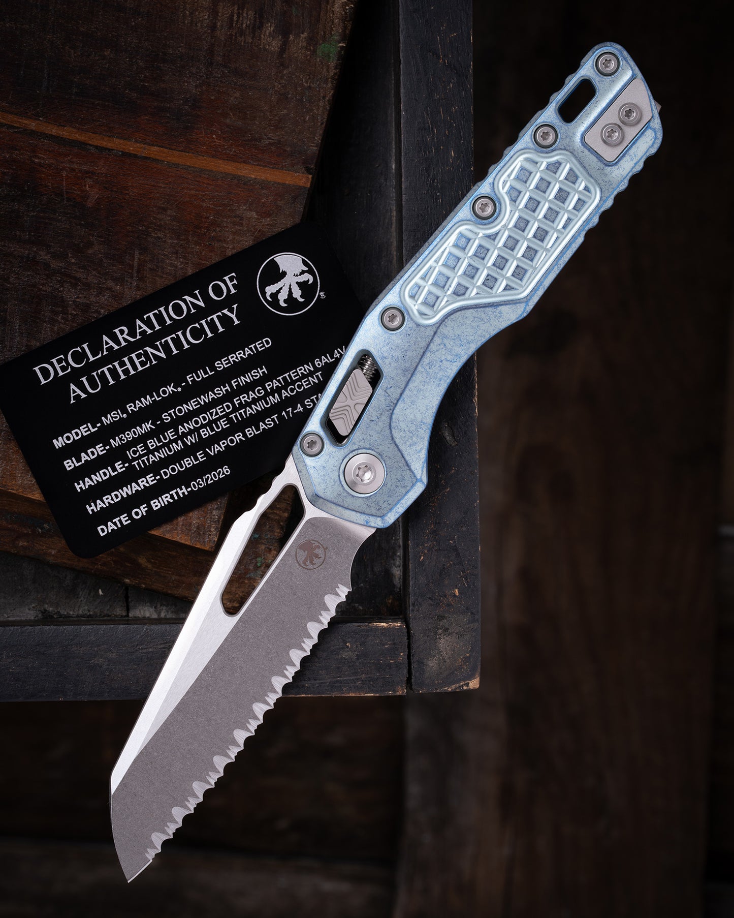 MSI® RAM-LOK® MARFIONE SELECT FULL SERRATED STONEWASH FINISH ICE BLUE ANODIZED FRAG PATTERN TITANIUM W/ BLUE TITANIUM ACCENT DOUBLE VAPOR BLAST STAINLESS (210-12FRMS6)