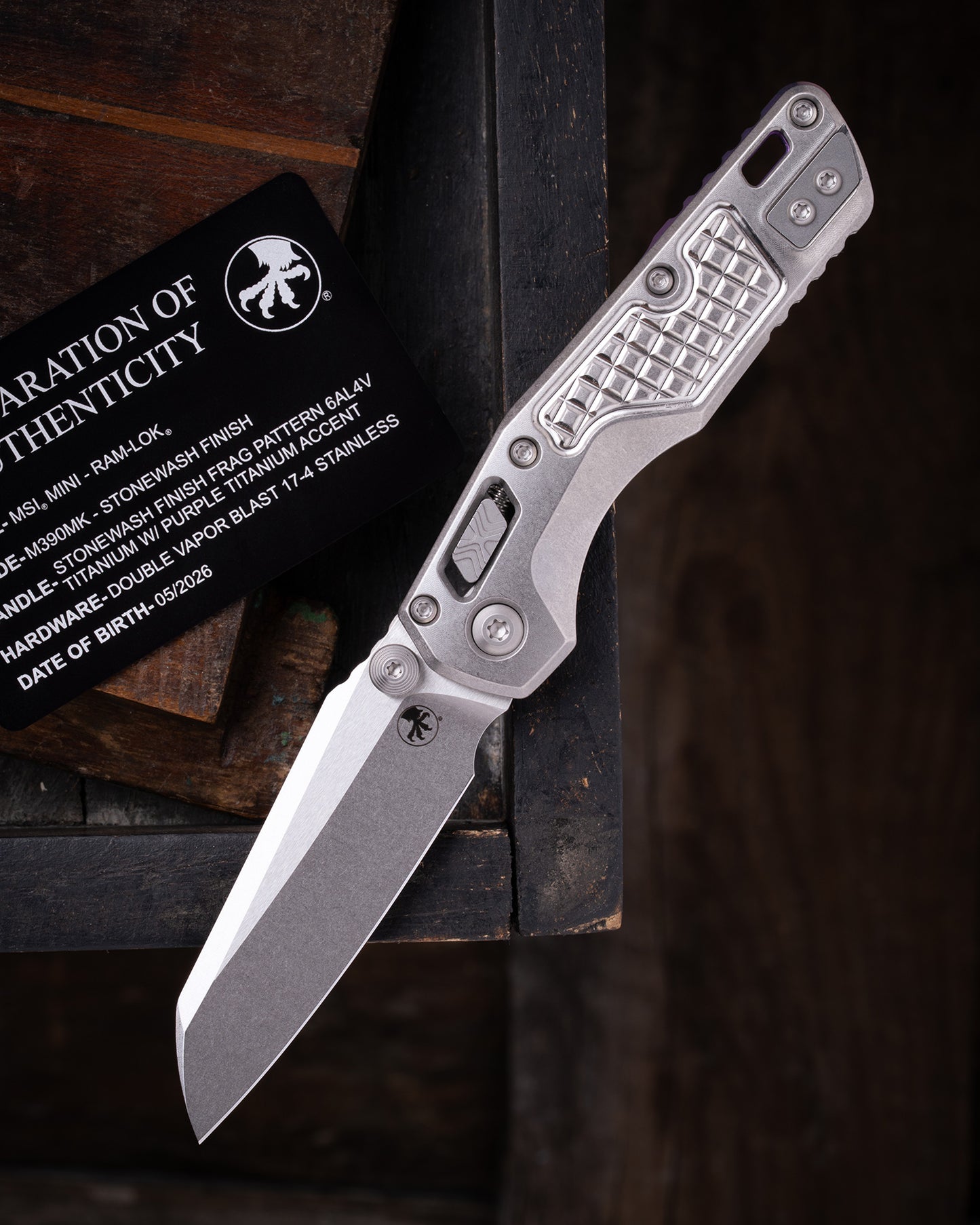 MSI® MINI- RAM-LOK MARFIONE SELECT STONEWASH FINISH STONEWASH FINISH FRAG PATTERN TITANIUM W/ PURPLE TITANIUM ACCENT DOUBLE VAPOR BLAST STAINLESS (210M-10FRMS4)
