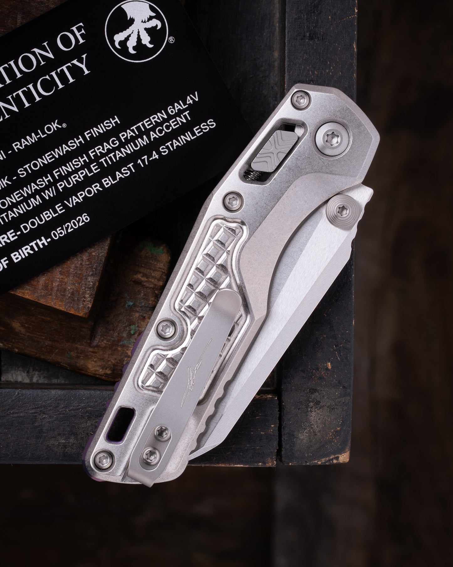 MSI® MINI- RAM-LOK MARFIONE SELECT STONEWASH FINISH STONEWASH FINISH FRAG PATTERN TITANIUM W/ PURPLE TITANIUM ACCENT DOUBLE VAPOR BLAST STAINLESS (210M-10FRMS4)