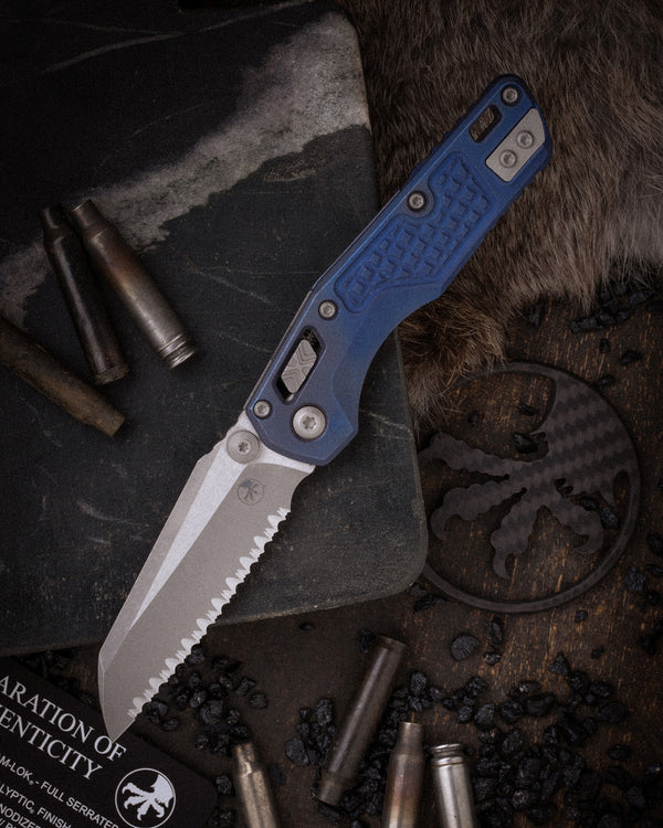 MSI® RAM-LOK® MINI FULL SERRATED MARFIONE SELECT APOCALYPTIC® FINISH ANTIQUE BLUE ANODIZED FRAG PATTERN TITANIUM W/ BLUE TITANIUM ACCENT APOCALYPTIC® STAINLESS (210M-12APFRMS2)