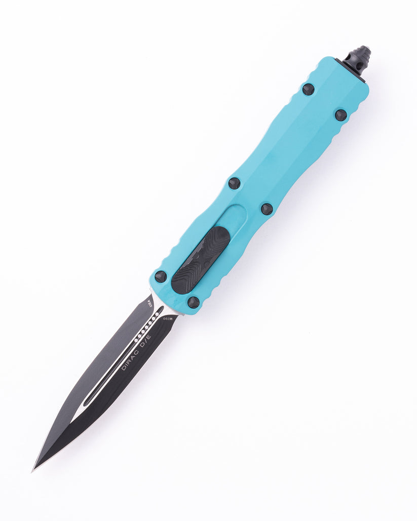 Microtech OTF automatic knives side by side comparison on dark tactical surface