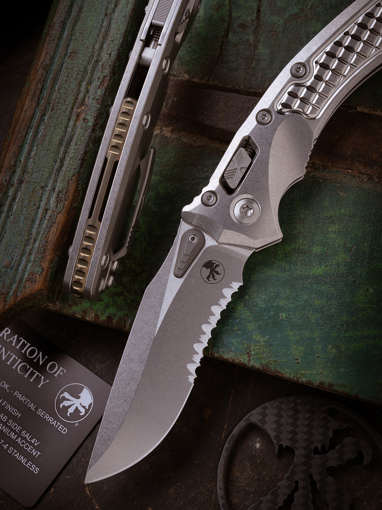 Amphibian® - RAM-LOK™ PARTIAL SERRATED MARFIONE SELECT STONEWASH FINISH STONEWASH FINISH FRAG PATTERN TITANIUM W/BRONZE TITANIUM ACCENT DOUBLE VAPOR BLAST STAINLESS (137RL-11FRMS1)