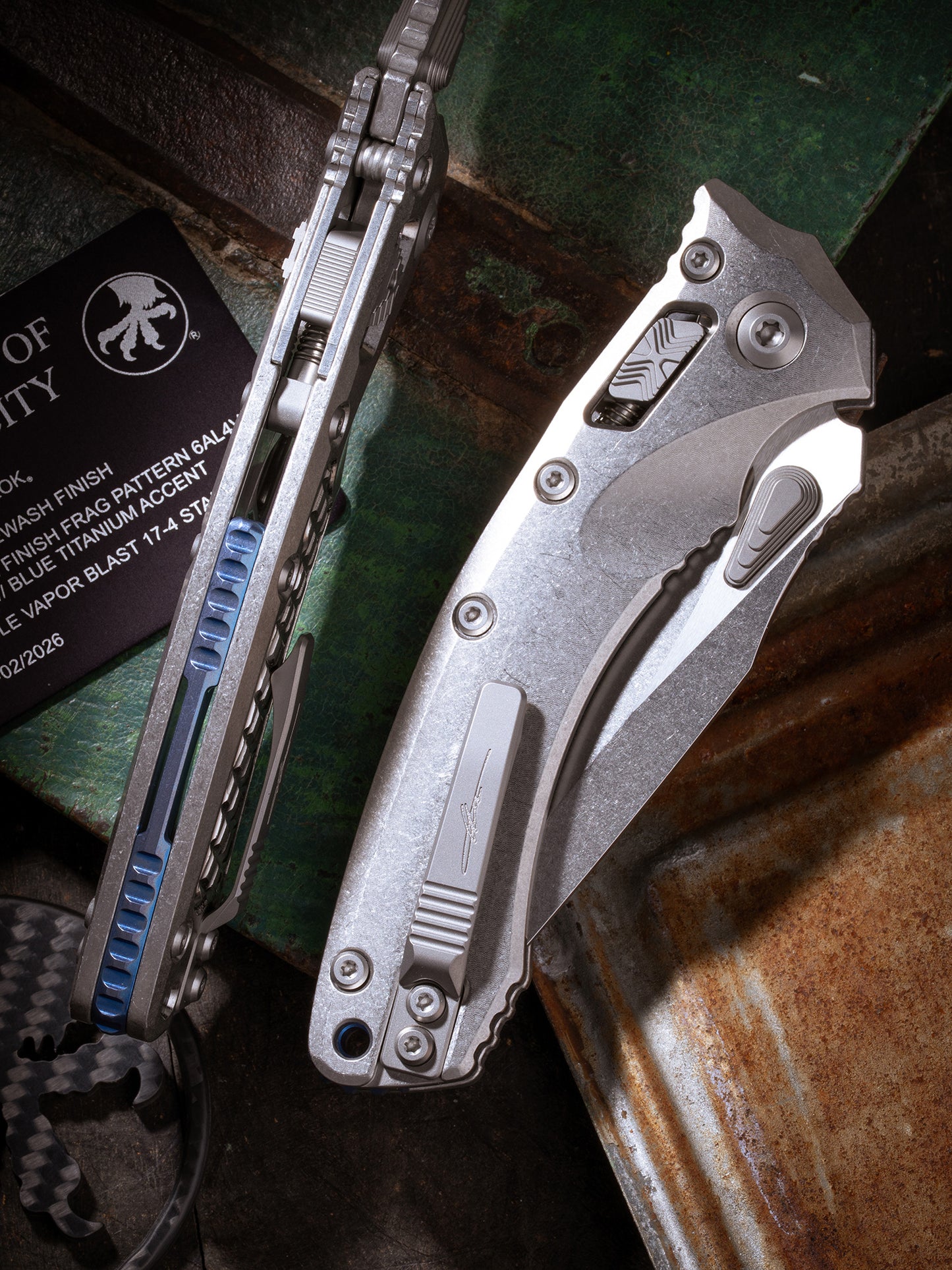 Amphibian® - RAM-LOK™ PARTIAL SERRATED MARFIONE SELECT STONEWASH FINISH STONEWASH FINISH SLAB SIDE TITANIUM W/BLUE TITANIUM ACCENT DOUBLE VAPOR BLAST STAINLESS (137RL-11MS2)