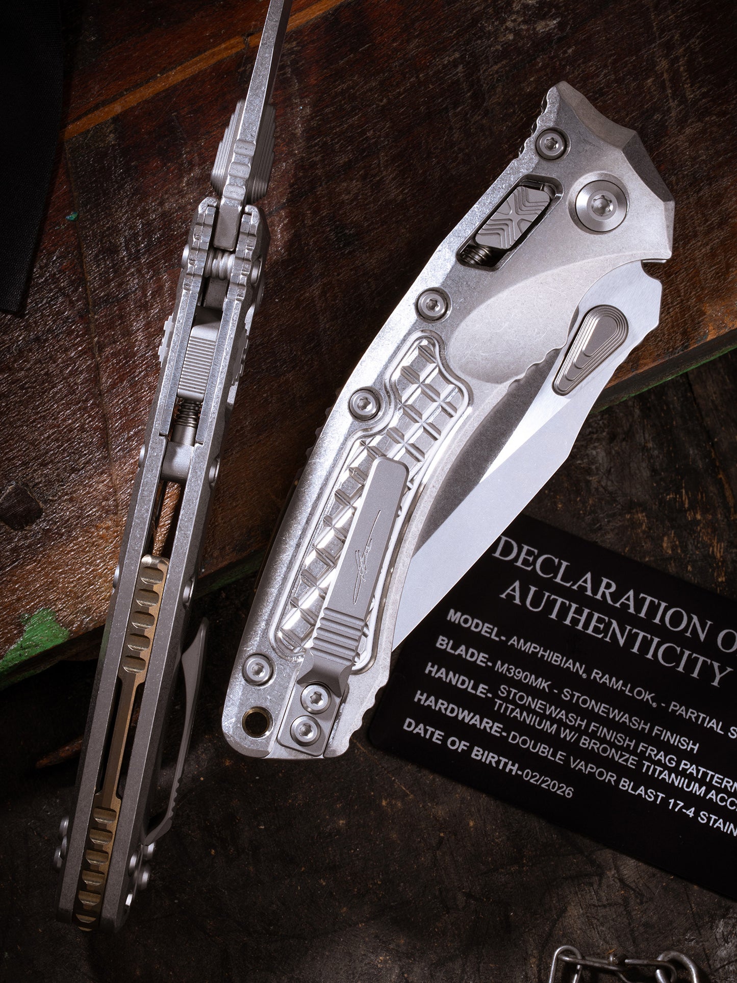 Amphibian® - RAM-LOK™ PARTIAL SERRATED MARFIONE SELECT STONEWASH FINISH STONEWASH FINISH FRAG PATTERN TITANIUM W/BRONZE TITANIUM ACCENT DOUBLE VAPOR BLAST STAINLESS (137RL-11FRMS1)