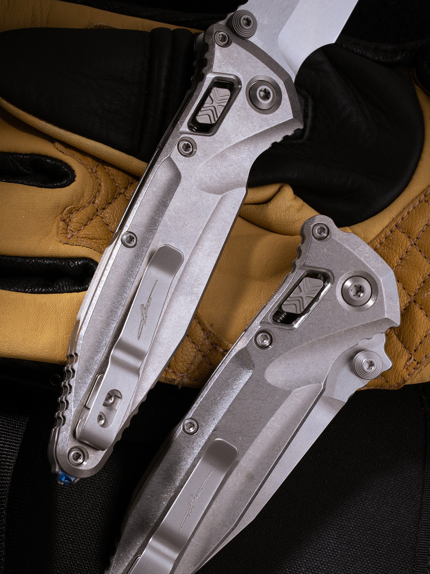 Socom® Elite Delta RAM-LOK™ – Spear Point Marfione Select Stonewash Finish Titanium W/ Blue titanium Accent Double Vapor Blast