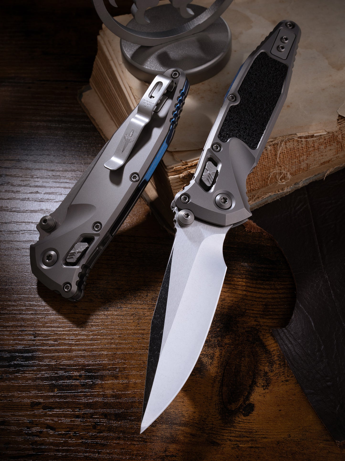 Socom® Elite RAM-LOK™ – Clip Point Cracked Ice Finish Double Vapor Blast Titanium w/ Textured Inlay & Blue Ti Accent Double Vapor Blast Stainless Prototype