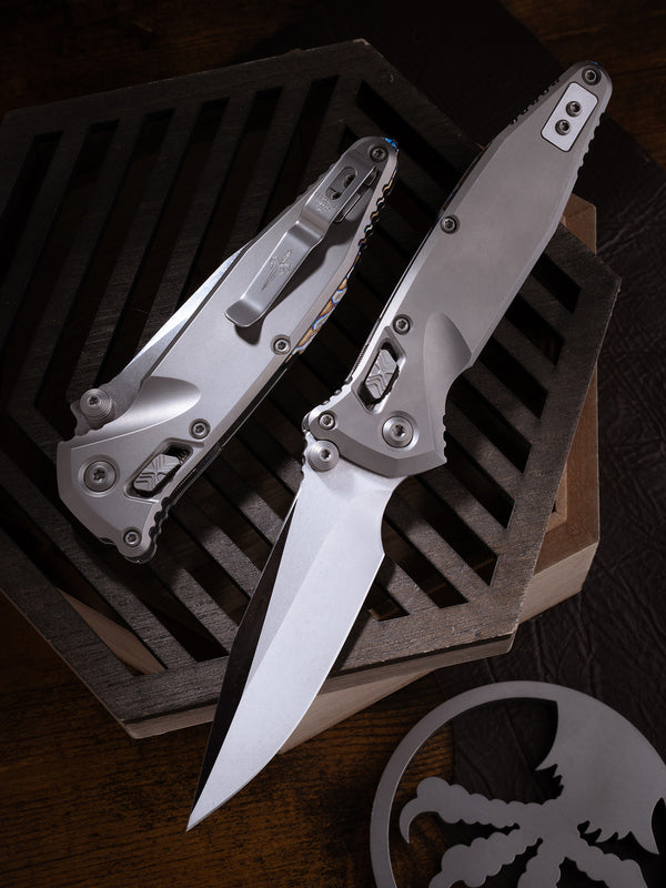 Socom® RAM-LOK™ – Clip Point Cracked Ice Finish Double Vapor Blast Slab Side Titanium w/ Flamed Ti Accent Double Vapor Blast Stainless Prototype