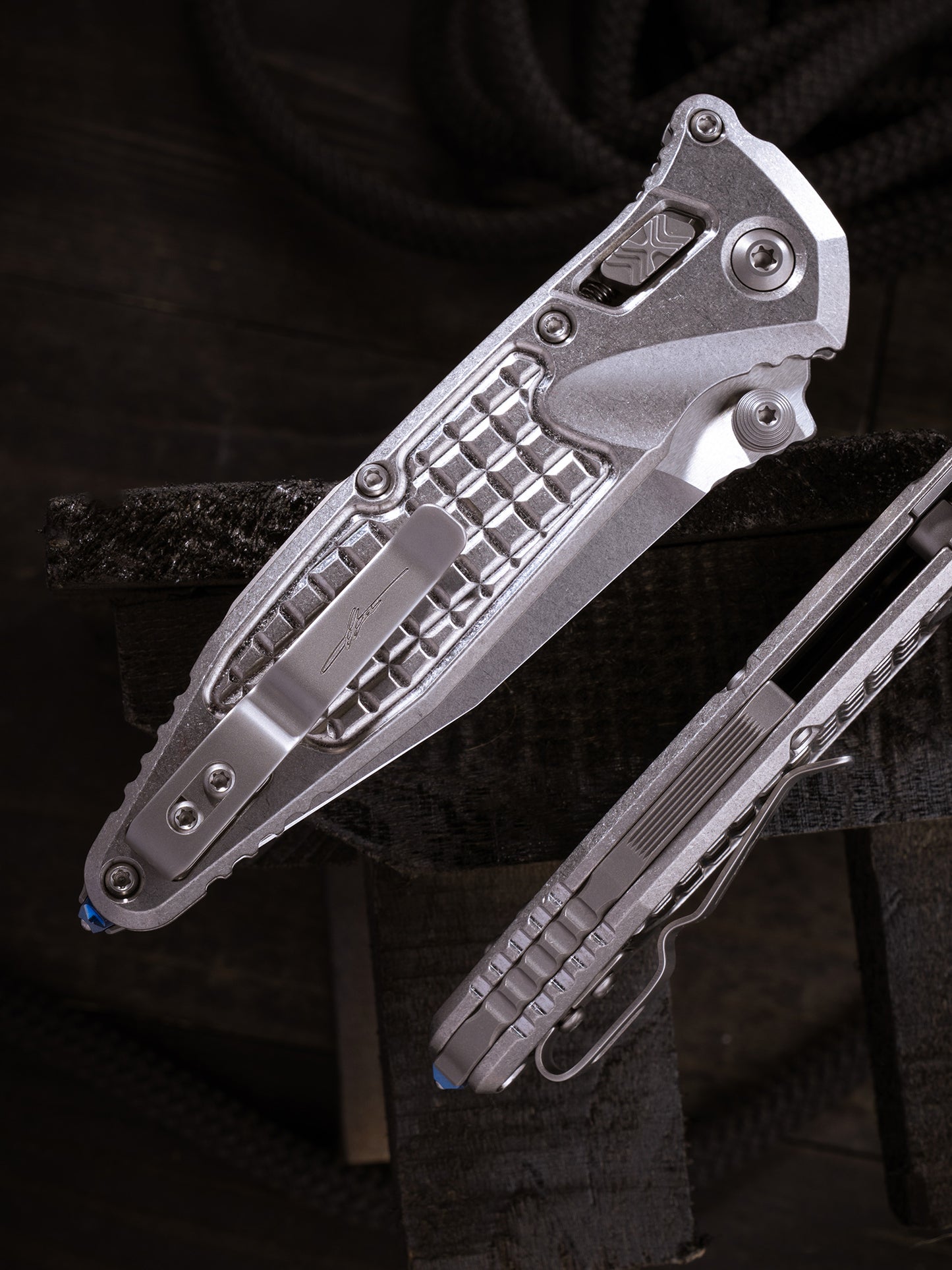 Socom® Elite RAM-LOK™ – Spear Point Marfione Select Stonewash Finish Frag Pattern Titanium W/ Blue Titanium Accent Double Vapor Blast Stainless