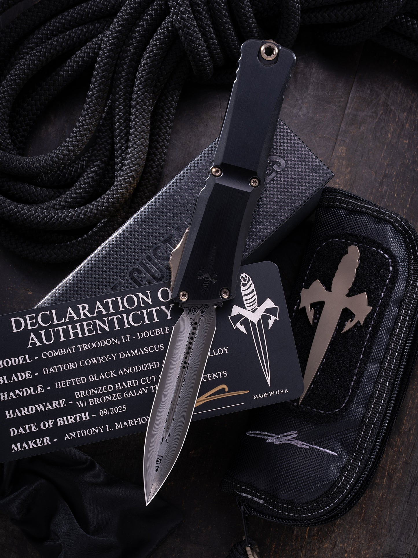 COMBAT TROODON LT – DOUBLE EDGE HATTORI COWRY-Y DAMASCUS HEFTED BLACK ANODIZED ALLOY BRONZED HARD CUT STAINLESS W/BRONZE TITANIUM ACCENTS