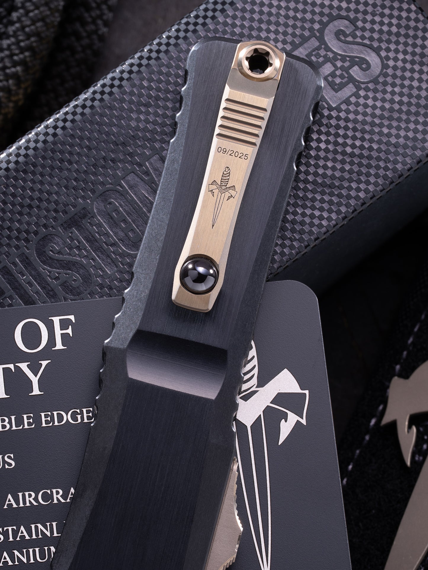 COMBAT TROODON LT – DOUBLE EDGE HATTORI COWRY-Y DAMASCUS HEFTED BLACK ANODIZED ALLOY BRONZED HARD CUT STAINLESS W/BRONZE TITANIUM ACCENTS